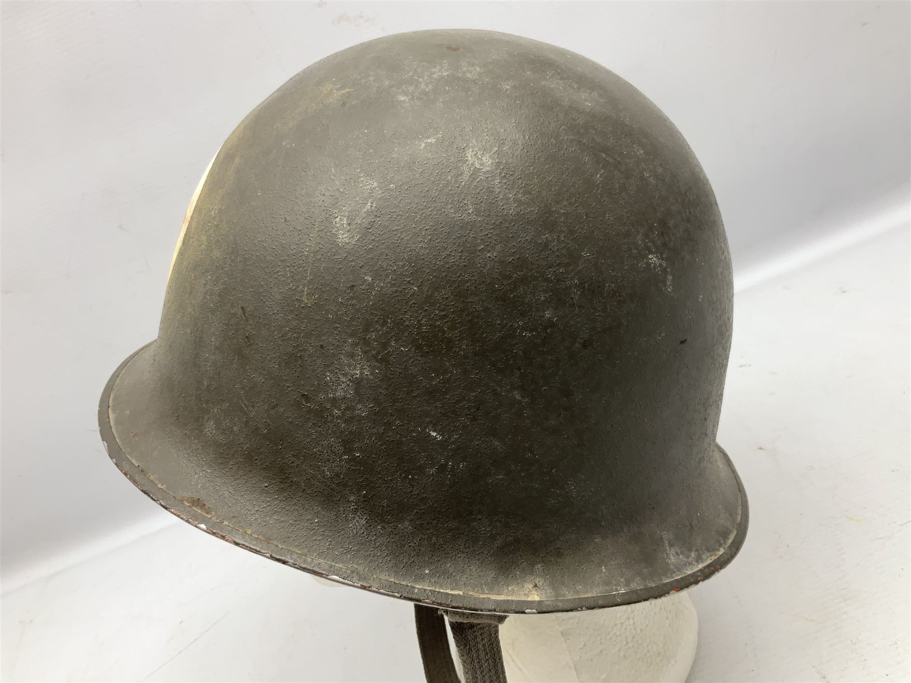 French Algerian War Red Cross steel helmet, marked 'CP ICA Esperaza 1955'; green finish with crudely painted Red Cross logo to the front