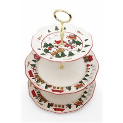Masons Christmas Village tea wares, designed by Marsten-Mandrajji, comprising three-tiered an other cake stand, large bowl and jug, two twin-handled serving dishes, mug and two teacups, plates of various sizes etc