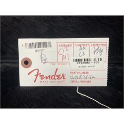 Fender Precision Bass guitar, in Olympic White finish with tortoiseshell effect scratchboard, serial no US15103092, in black Fender hard case with Fender strap and warranty card, guitar L116cm