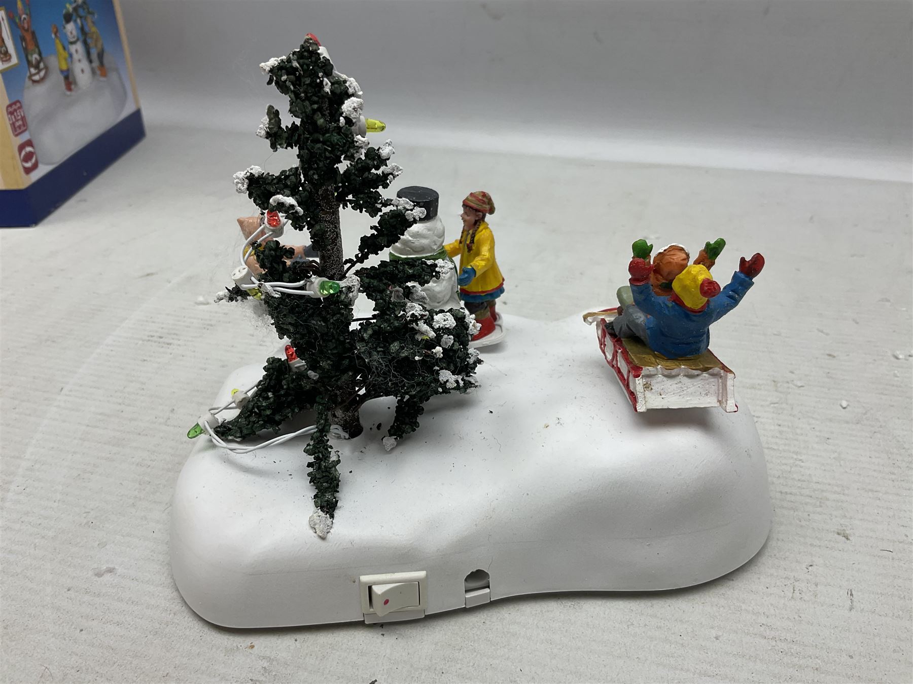 Christmas decorations; Lamax light up English Lane wall hanging, together with Lemax Frolic in the snow, Victorian parkway and other christmas signs and figures