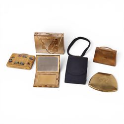Six powder compacts, including Kigu Bon Voyage example modelled as a suitcase with travel ...