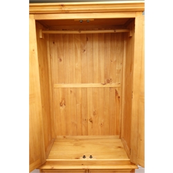  Solid pine double wardrobe, projecting cornice, two doors enclosing hanging rail above two short and one long drawer, plinth base, W100cm, H192cm, D54cm  