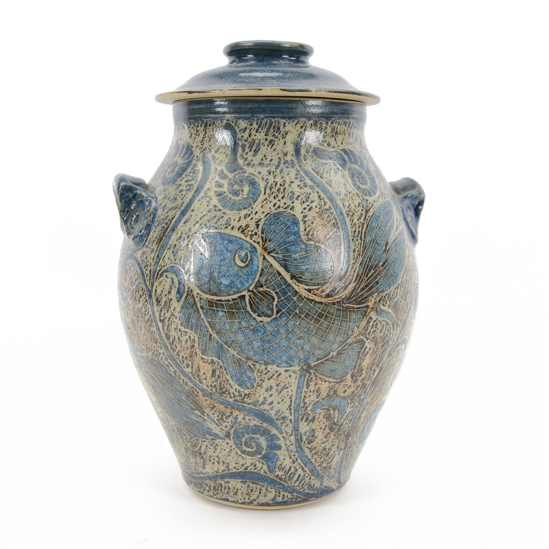 John Egerton (c1945-): studio pottery stoneware vase and cover, decorated with fish and ammonites upon a blue ground, H38cm