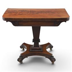 Victorian figured mahogany side table, fold-over swivel extending top, tapering square column above quatrefoil base