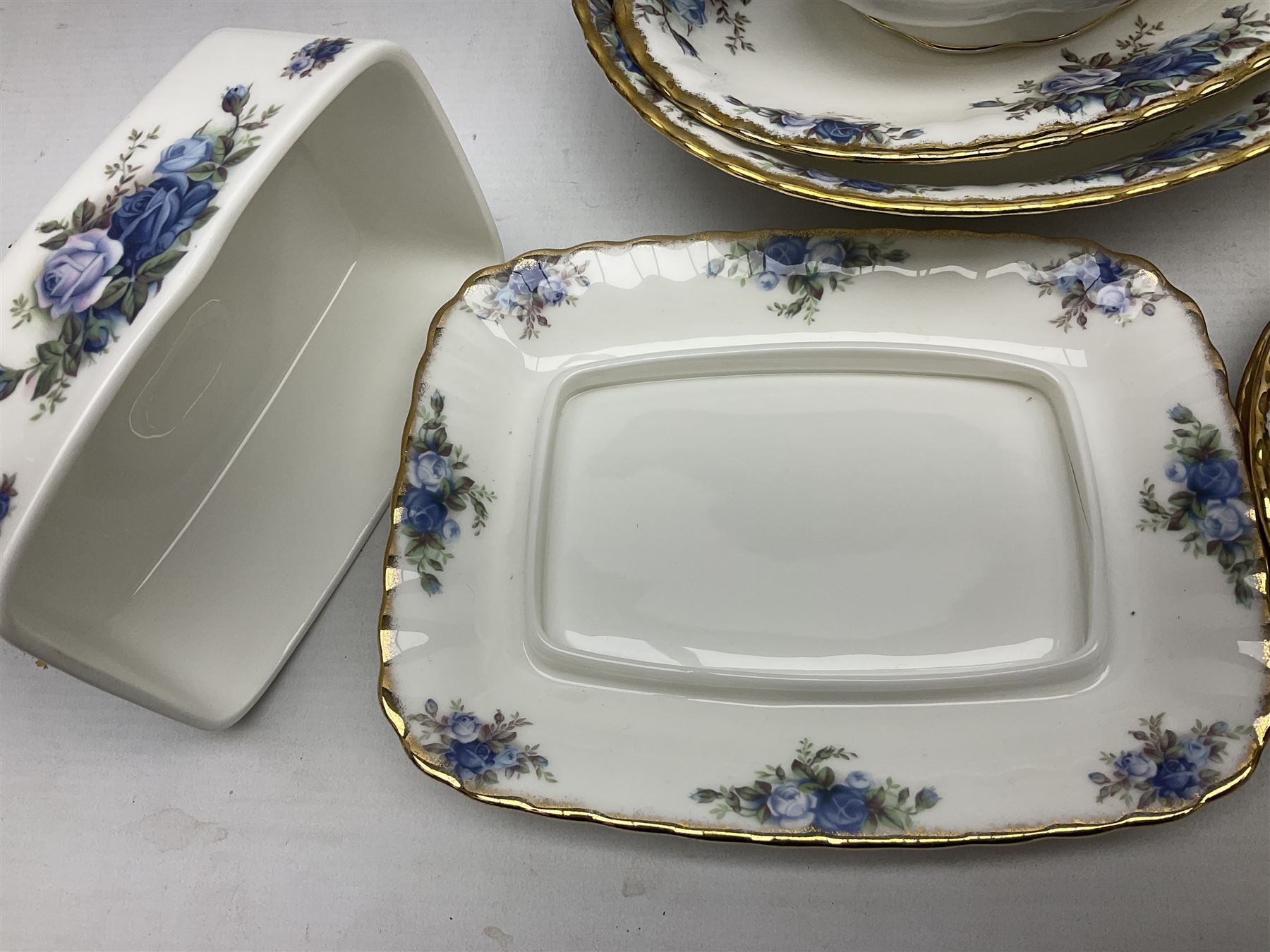 Royal Albert Moonlight Rose pattern dinner service for six, to include, dinner plates, bowls, soup bowls, twin handled soup bowls with saucers, twelve side plates, twin handled soup tureen with cover, twin handled serving dish and cover, sauce boat and saucer, teapot and warmer etc (51)
