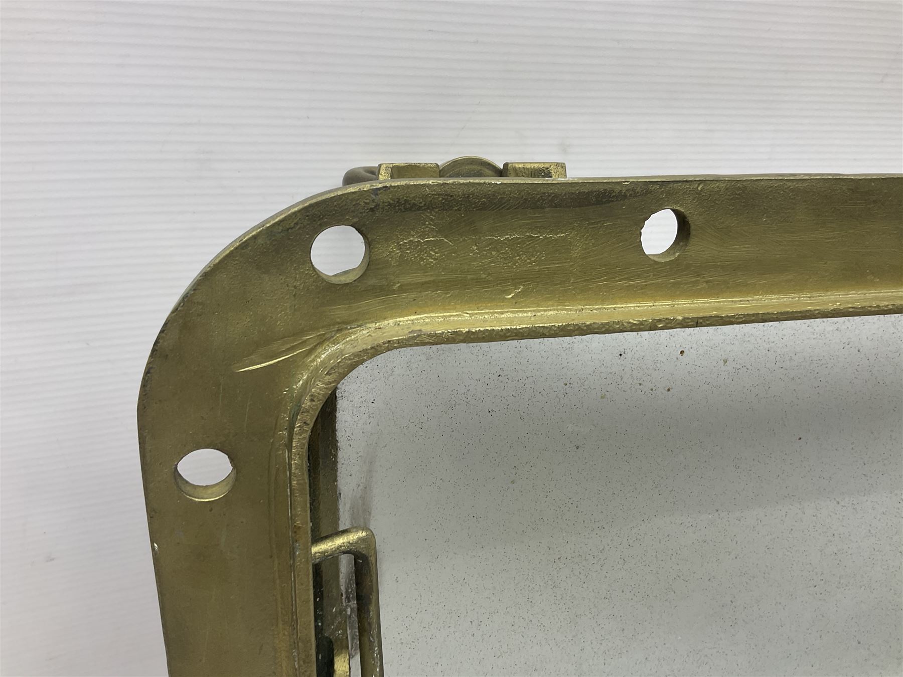 Rectangular brass porthole with hinged window, H46cm, L66cm