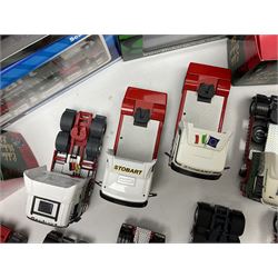 Eddie Stobart - three Oxford Die-Cast Super Rugby League lorries in perspex display cases including the two Hull Clubs; two Lledo Vanguard vans; two Days Gone vans; and Saico Truck & Trailer; all boxed; together with fourteen unboxed Corgi and other tractor/cab units etc (23)