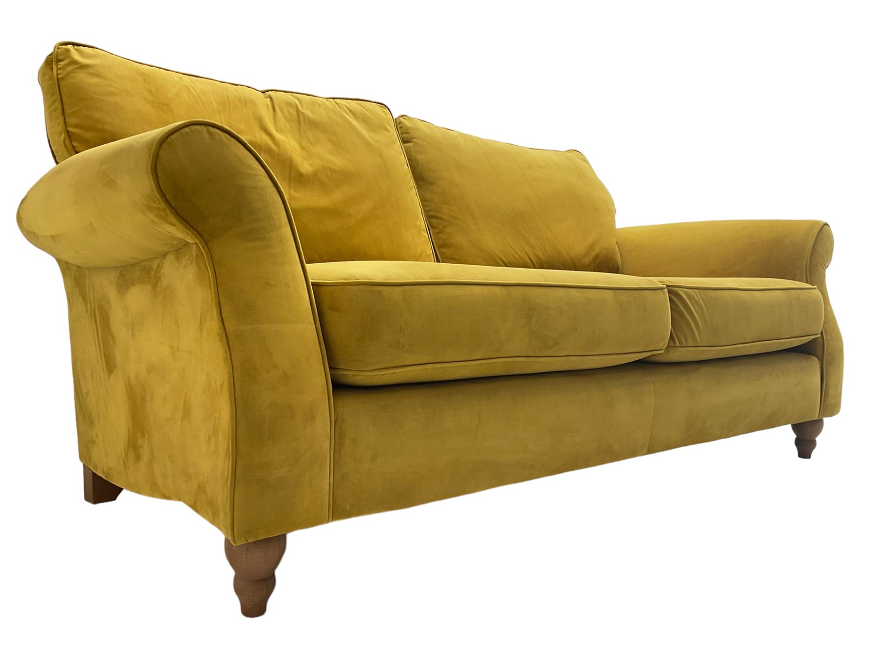 Next Furniture - traditional shaped three-seat sofa, upholstered in mustard velvet, rolled arms with pipping, on turned front feet