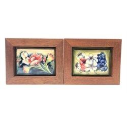  Two Moorcroft framed rectangular box lids decorated with floral sprays, 16cm x 13cm overall (2)  