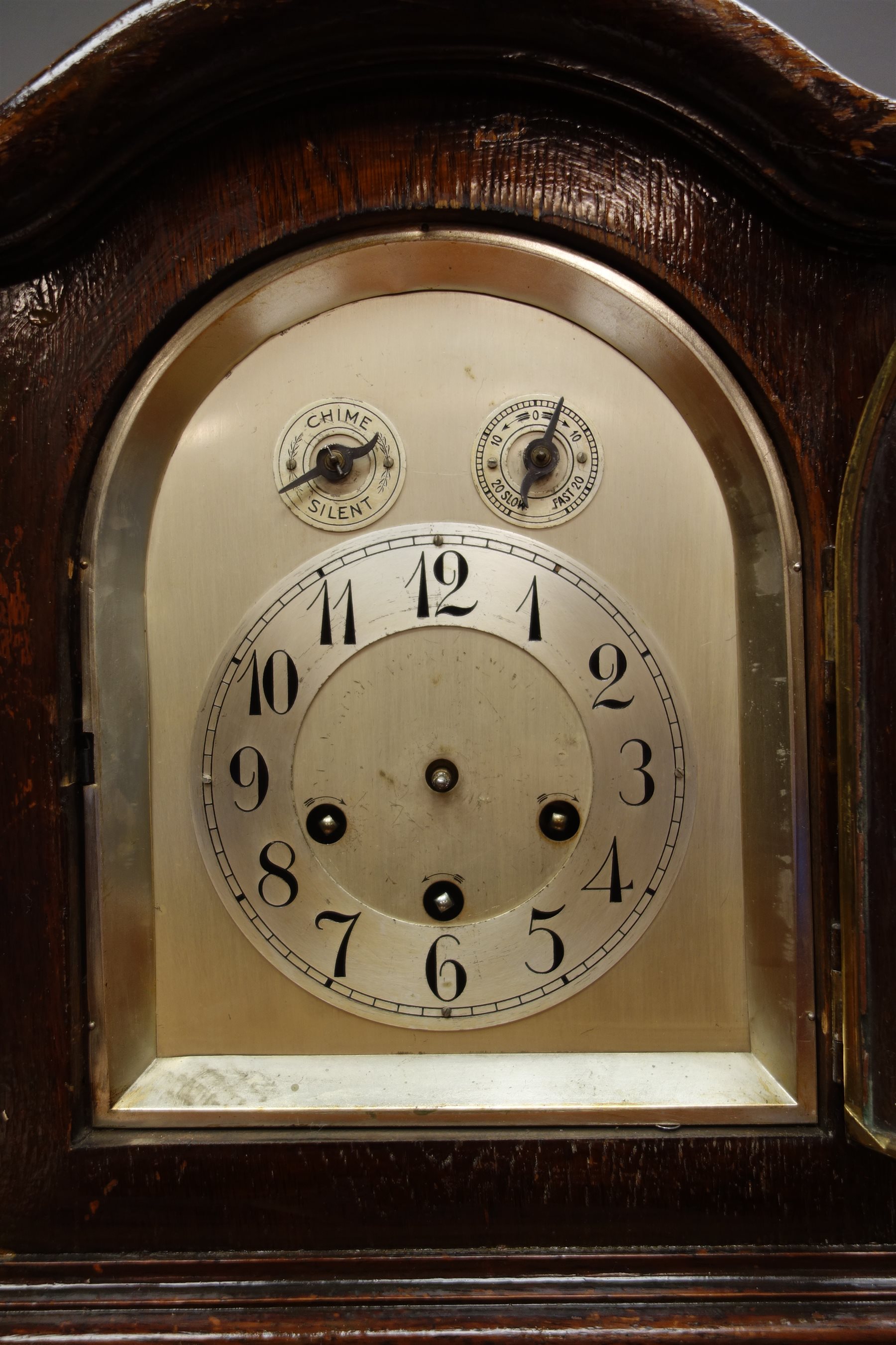 Early 20th century oak cased mantel clock, silvered dial with Arabic chapter ring, with chime