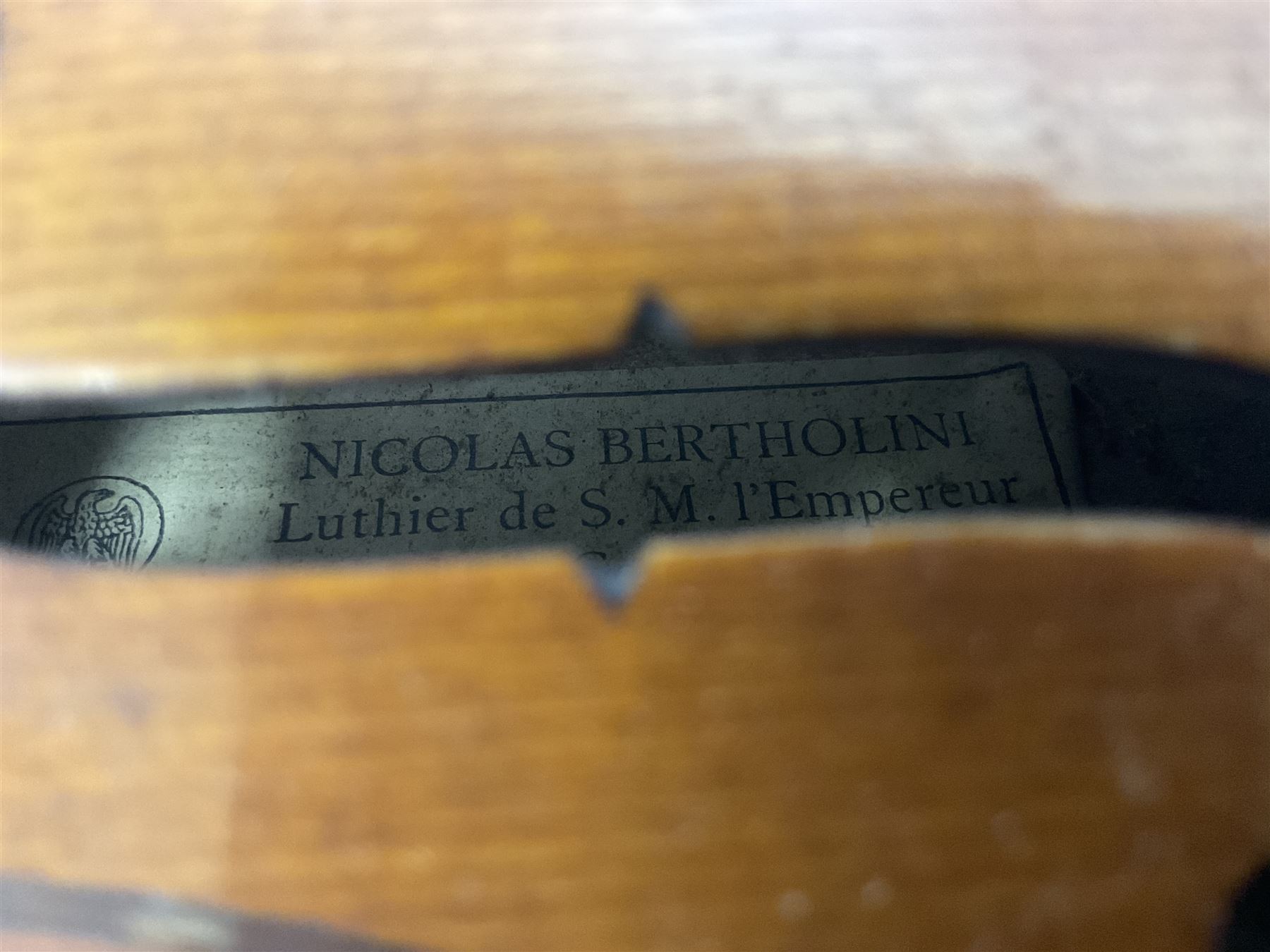 Four violins 1/8th size; half size with Nicolas Bertholini label; three-quarter size with Stradivarius copy label; and full size with Marquis De L'Air label (4)
