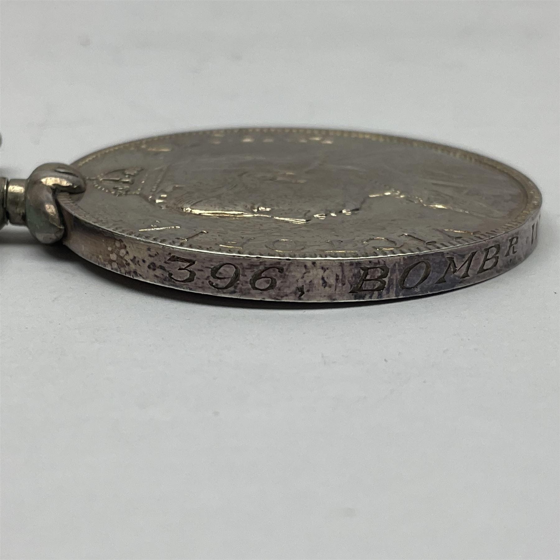 Victoria Long Service in the Volunteer Force Medal awarded to 369 Bombr. W. Woodward 1st Lincs. V.A.; and reproduction Victoria India Medal with Lucknow clasp; both with ribbons (2)