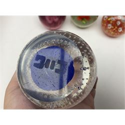 Collection of glass paperweights, to includes examples with internal air bubble inclusions and ones with internal flowers (11)