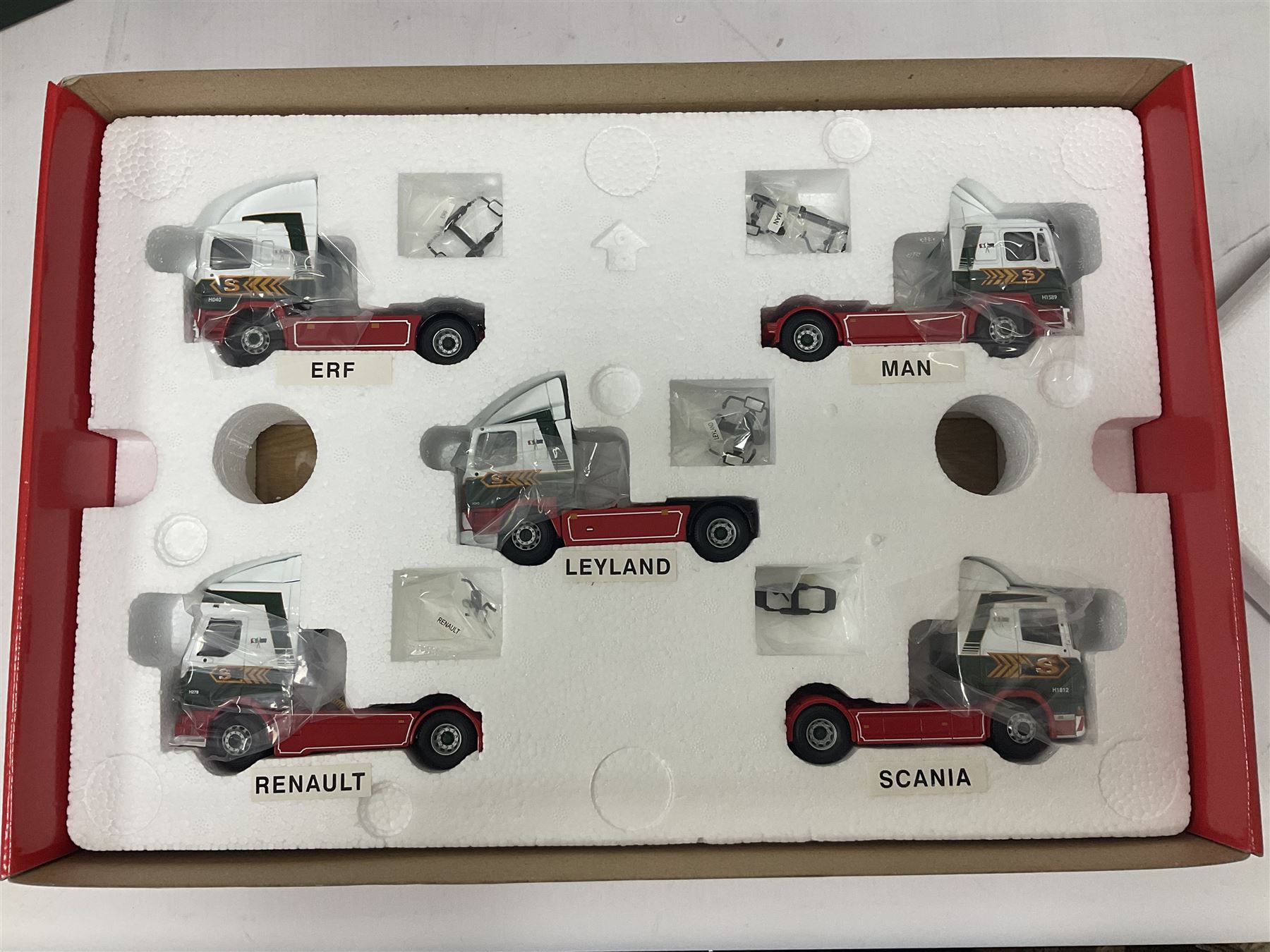 Corgi - three limited edition Eddie Stobart sets - 76901 30th Anniversary 1970-2000; boxed with delivery packaging; CC99155 Scania@Stobart; and CC86610 The Eddie Stobart Story; both boxed (3)