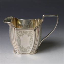 Late Victorian silver twin handled open sucrier and milk jug, of fluted form with panels of engraved foliate decoration, hallmarked D & M Davis, London 1896