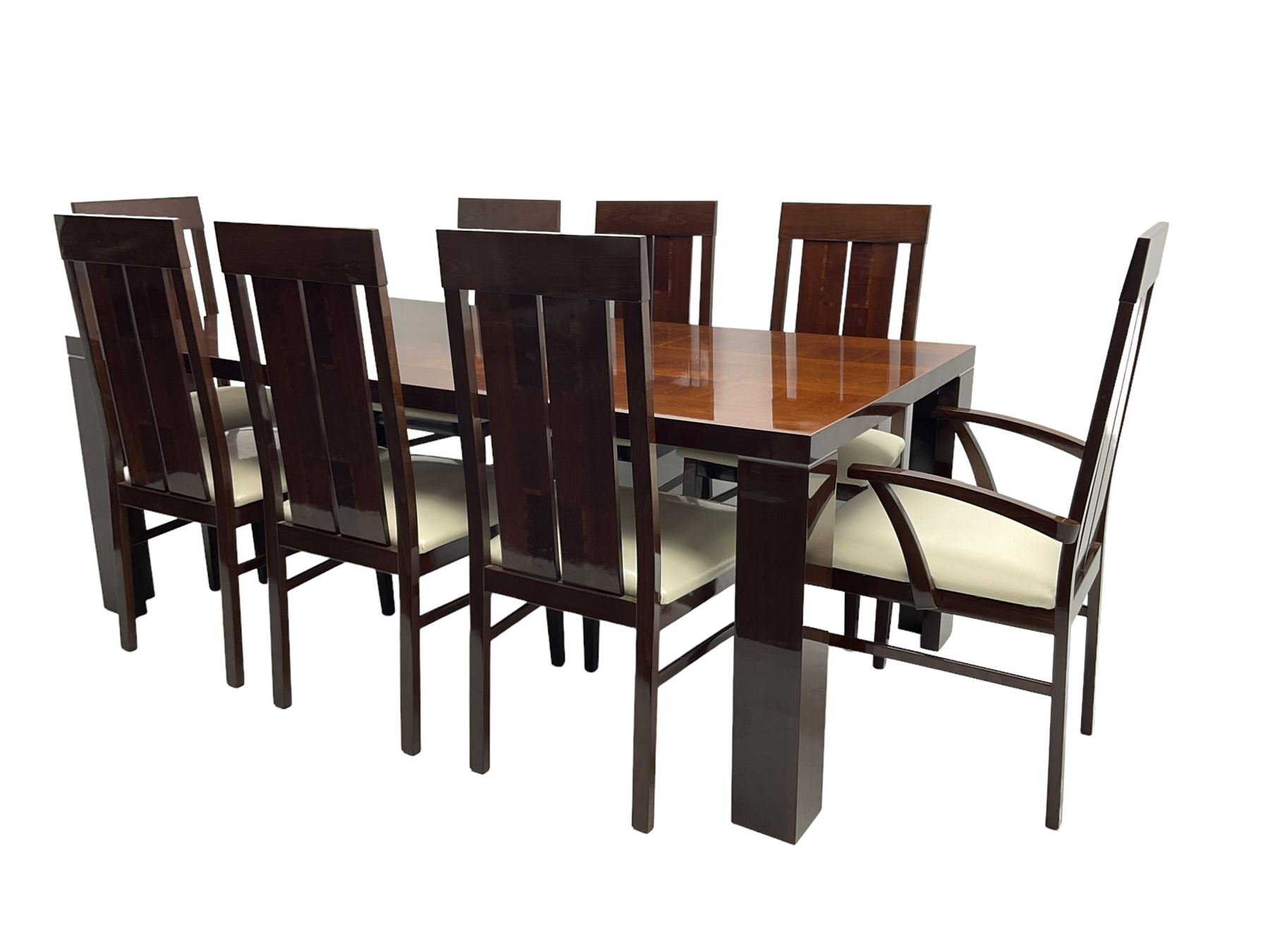 Large American walnut rectangular dining table on square block supports, together with set eight high back dining chairs with cream upholstered seats, the top and chair backs with matching inlaid geometric banding