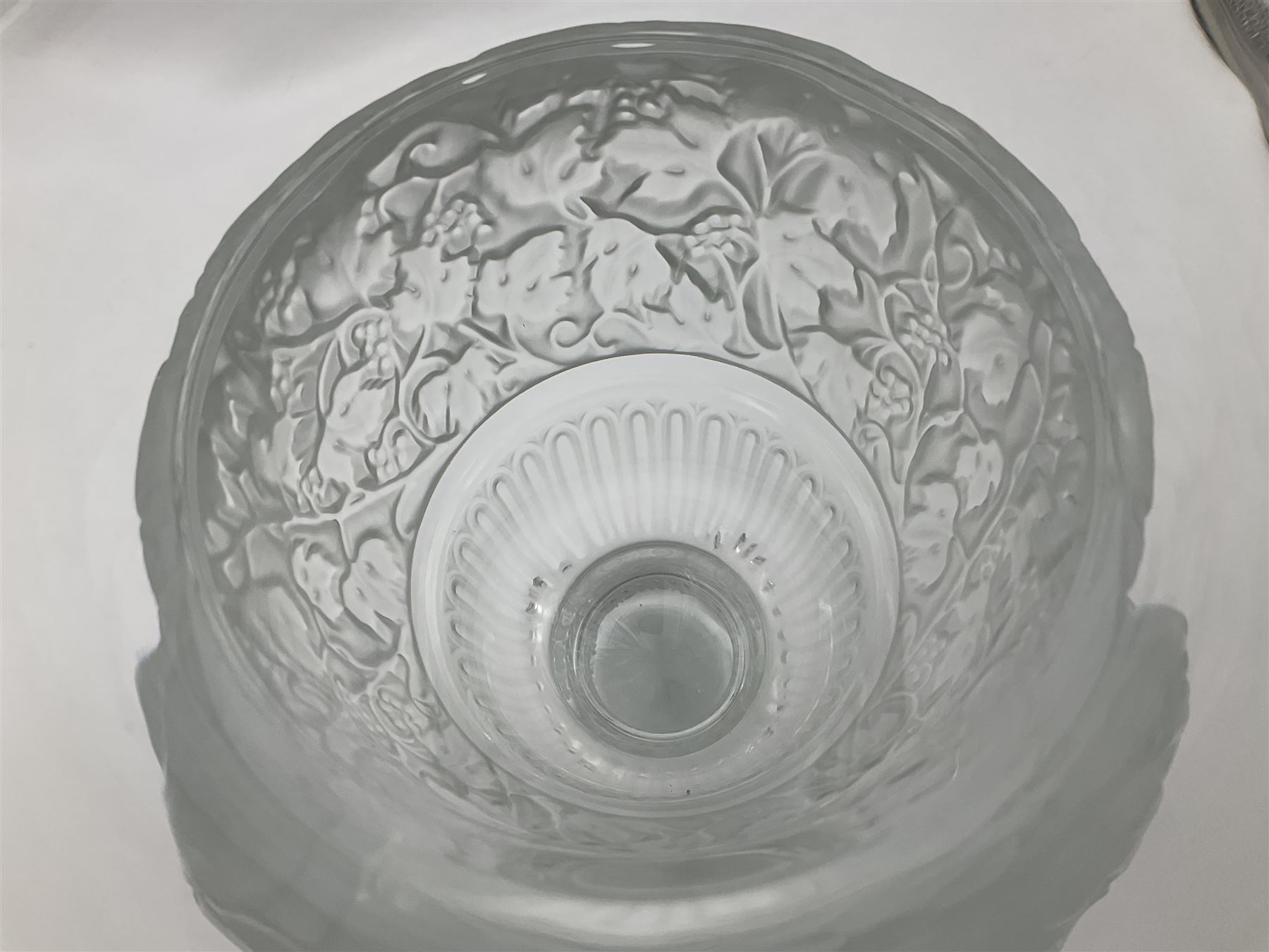 Large and impressive Lalique Versailles pattern glass vase, of classical baluster form with gadrooned flared rim, the body moulded in relief with fruiting vines above part fluting, upon a spreading circular foot with moulded decoration, and plain square plinth base, signed Lalique France to side of plinth, overall H35cm, with original box 