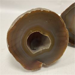 Three polished brown agate geodes, largest H13cm, L18cm
