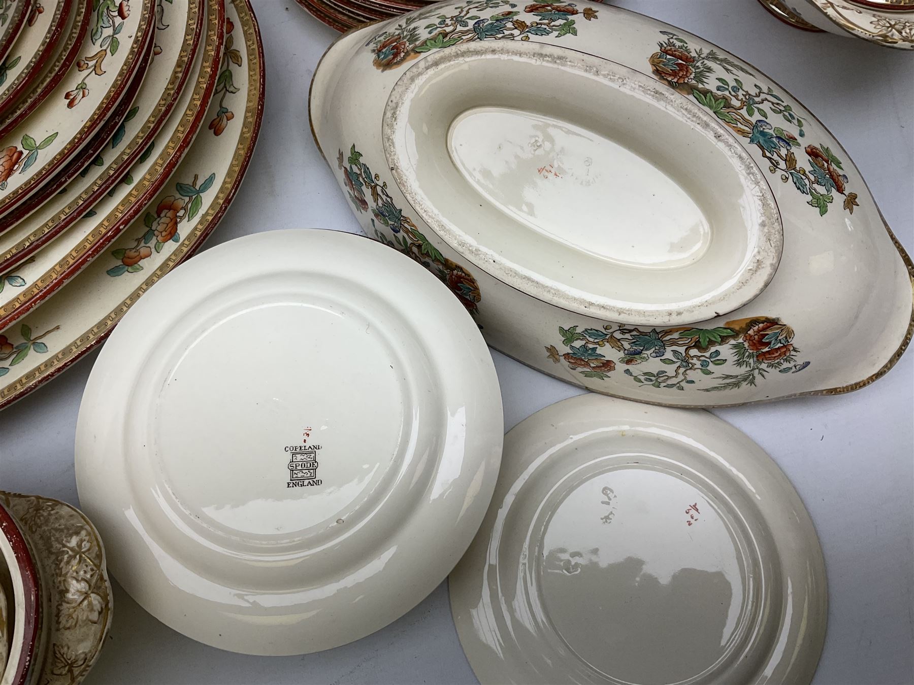 Victorian Copeland Spode Indian Tree pattern dinner service, to include sixteen dinner plates, fifteen side plates, eleven soup bowls in two sizes, four covered tureens of various forms, eight serving platters of various sizes etc  (74)