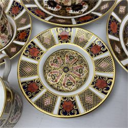 Royal Crown Derby 1128 Imari pattern two coffee cans and saucers, two teacups and saucers, all with printed mark beneath 