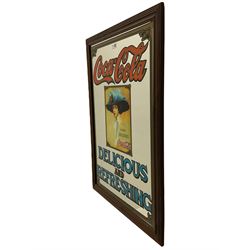 Late 20th century 'Coca Cola' style mirror (64cm x 89cm), and a 20th century frameless mirror (44cm x 67cm)