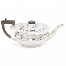 1920s silver tea pot, of oval bellied form, with Bakelite type handle and finial, hallmarked C W Fletcher & Son Ltd, Sheffield 1923, H15cm