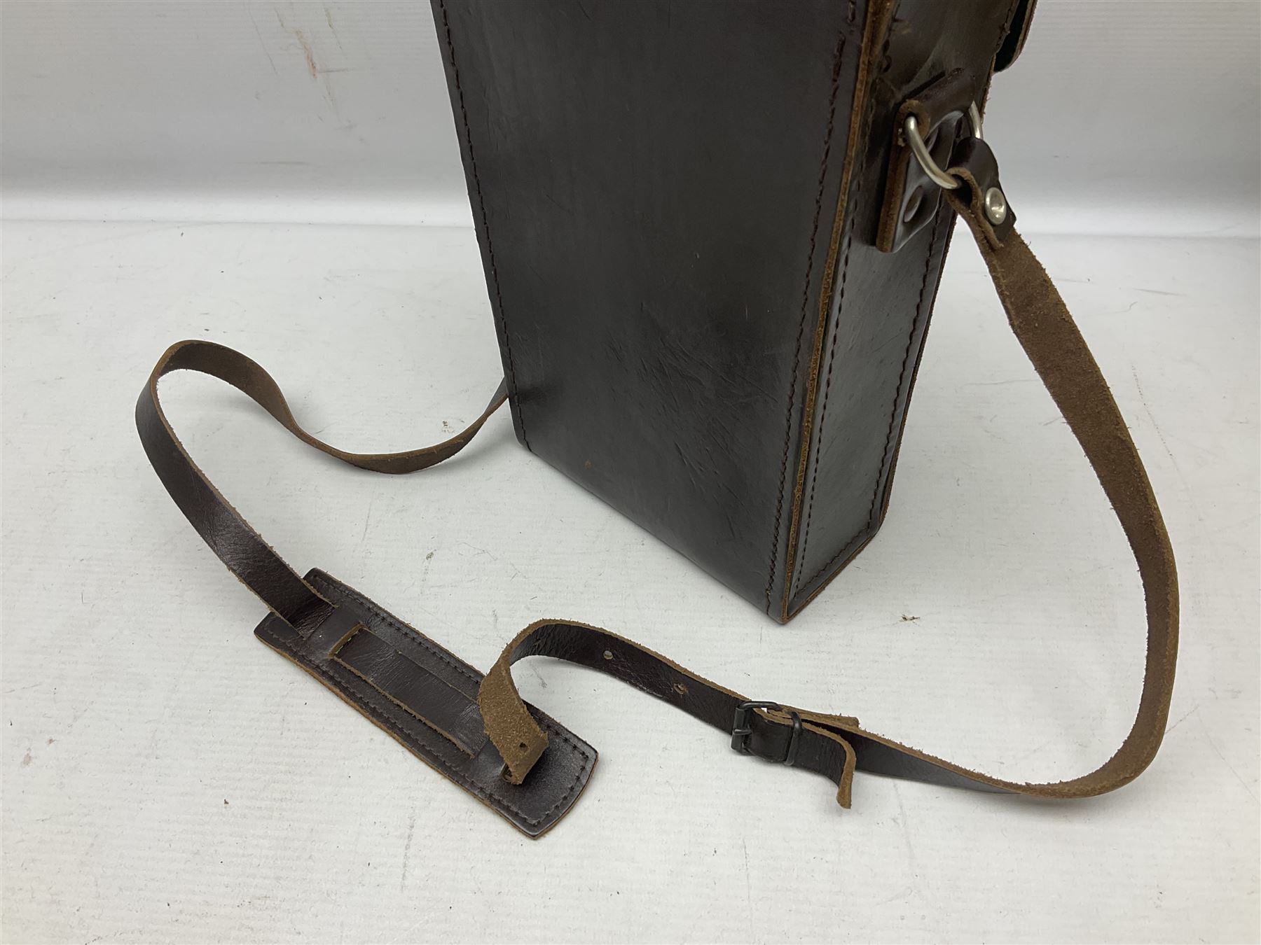 Pair of Optolyth 12 x 63 binoculars, made in Germany, serial no 82186, in leather case