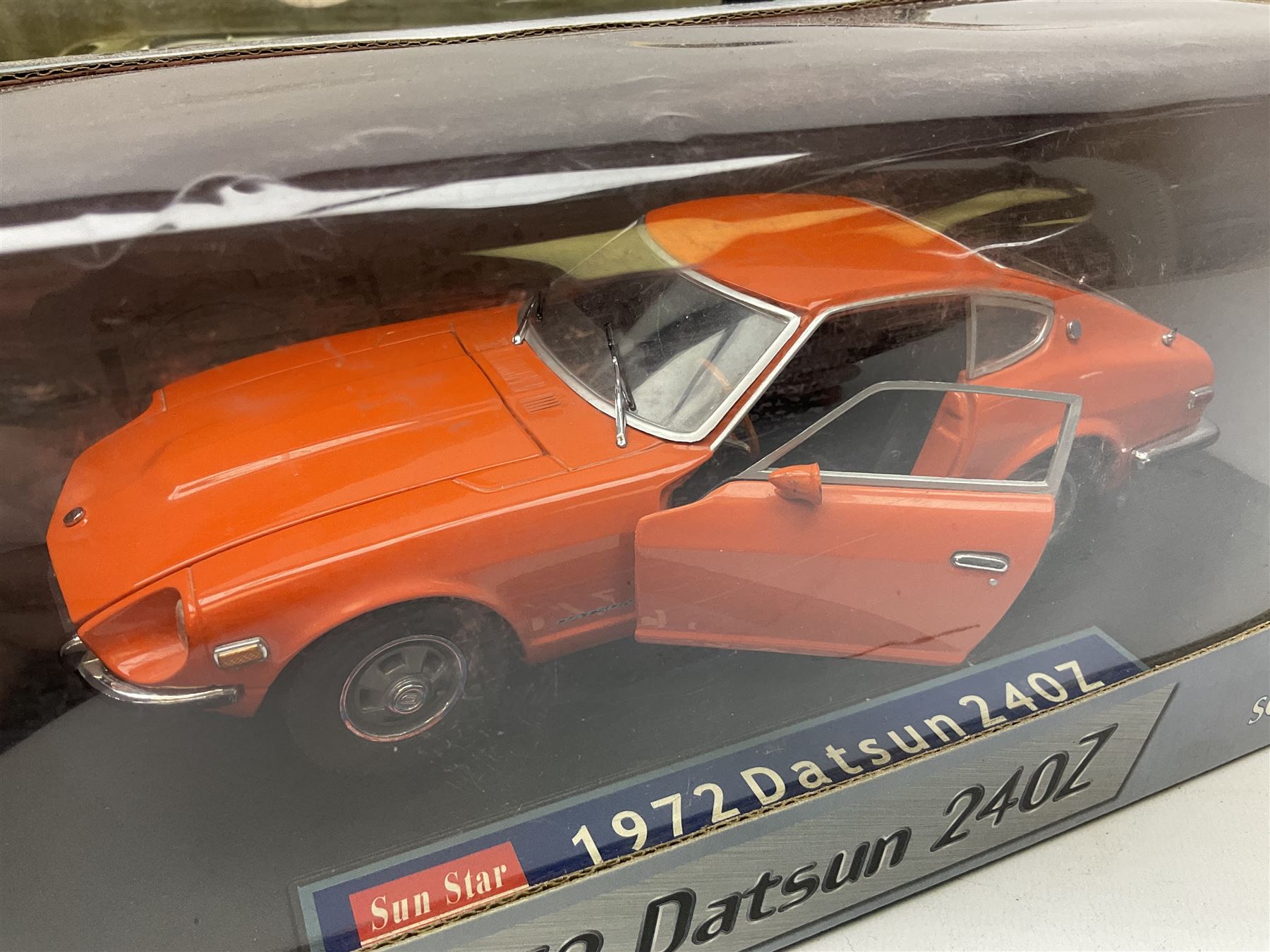 Sun Star - five 1:18 scale die-cast models comprising Ford Lincoln 2000 Limousine Millenium Edition; TX1 London Taxi Cab 1998; 1972 Datsun 240Z; 1939 Horch 855 Roadster; and Mercedes-Benz 350 SL; all boxed (5)