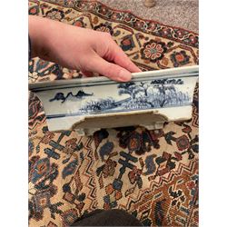 19th century Chinese blue and white planter and stand, each of square slightly tapering and flared form, the planter decorated with figures and precious objects between stylised foliate borders, the stand decorated with landscapes beneath a lipped rim with cell band, planter H28cm D25.5cm, stand H7cm D26cm