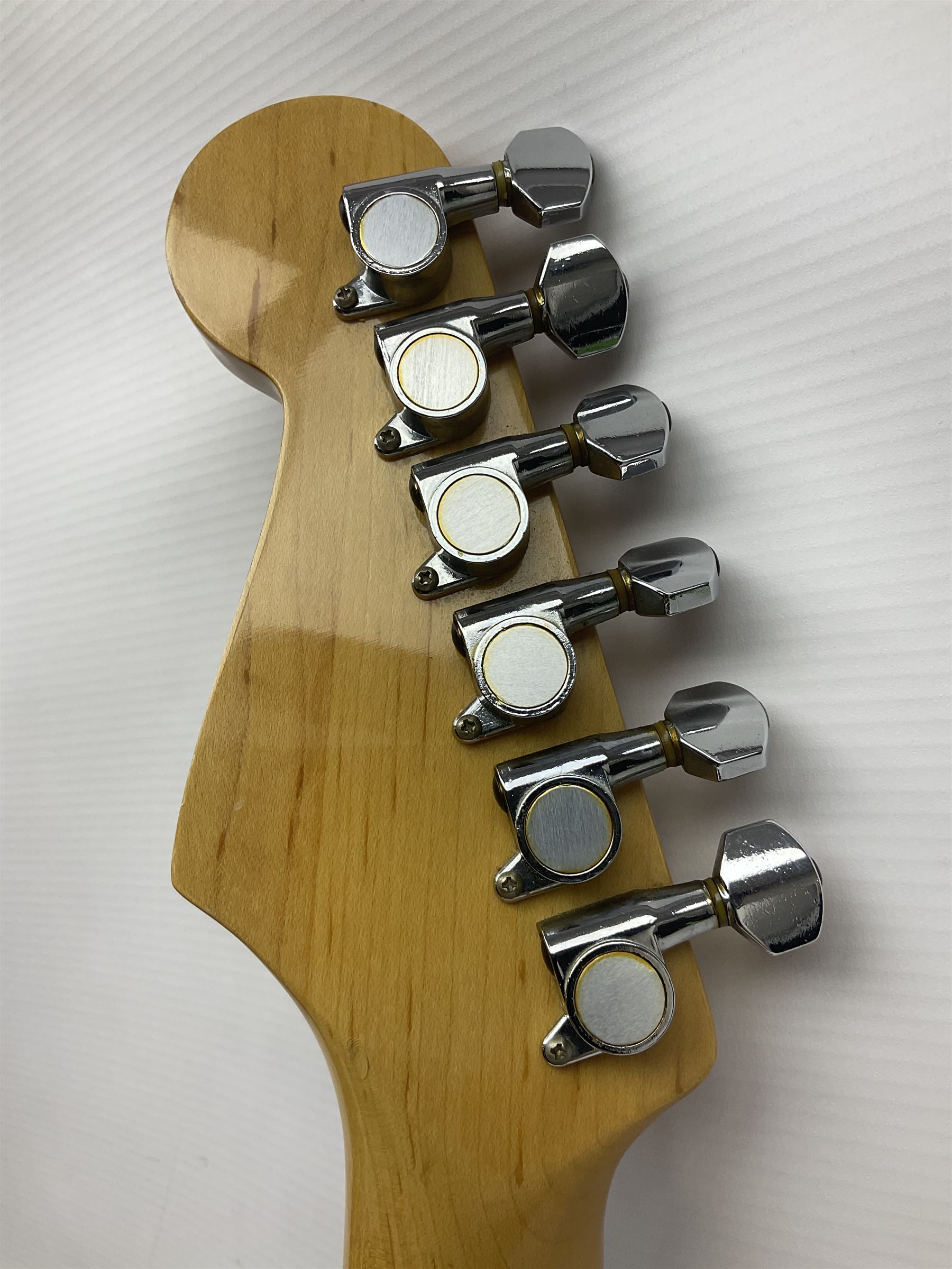 1990s Korean Squier Fender Stratocaster electric guitar in cherry red; serial no.S965951, L98cm