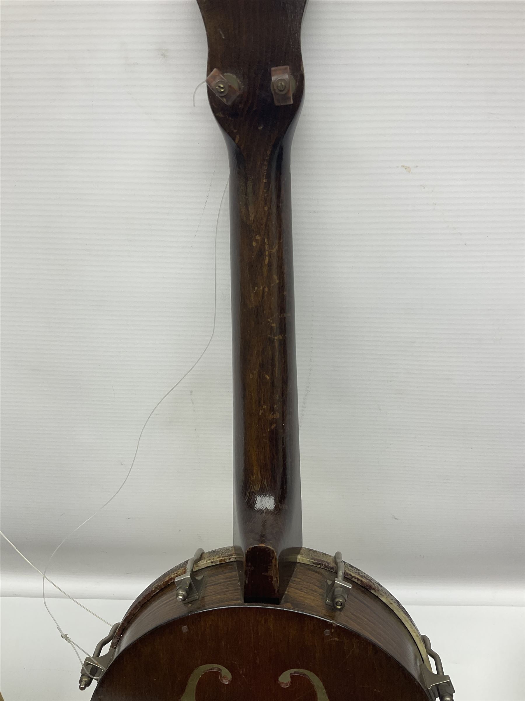 George Formby banjolele with metal plaque to headstock L55cm; in carrying case with instruction booklet.