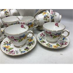 Shelley Spring Bouquet coffee wares, comprising coffee pot, eleven cups, twelve saucers, sucrier and milk jug, all with stamped green marks and pattern no 3651 beneath