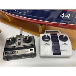 Two remote controlled kit-built plastic model boats - RNLB Sheerness Lifeboat Helen Turnbull L92cm and 'Conserver' Grangemouth L76cm; each on wooden stand; together with three remote control units