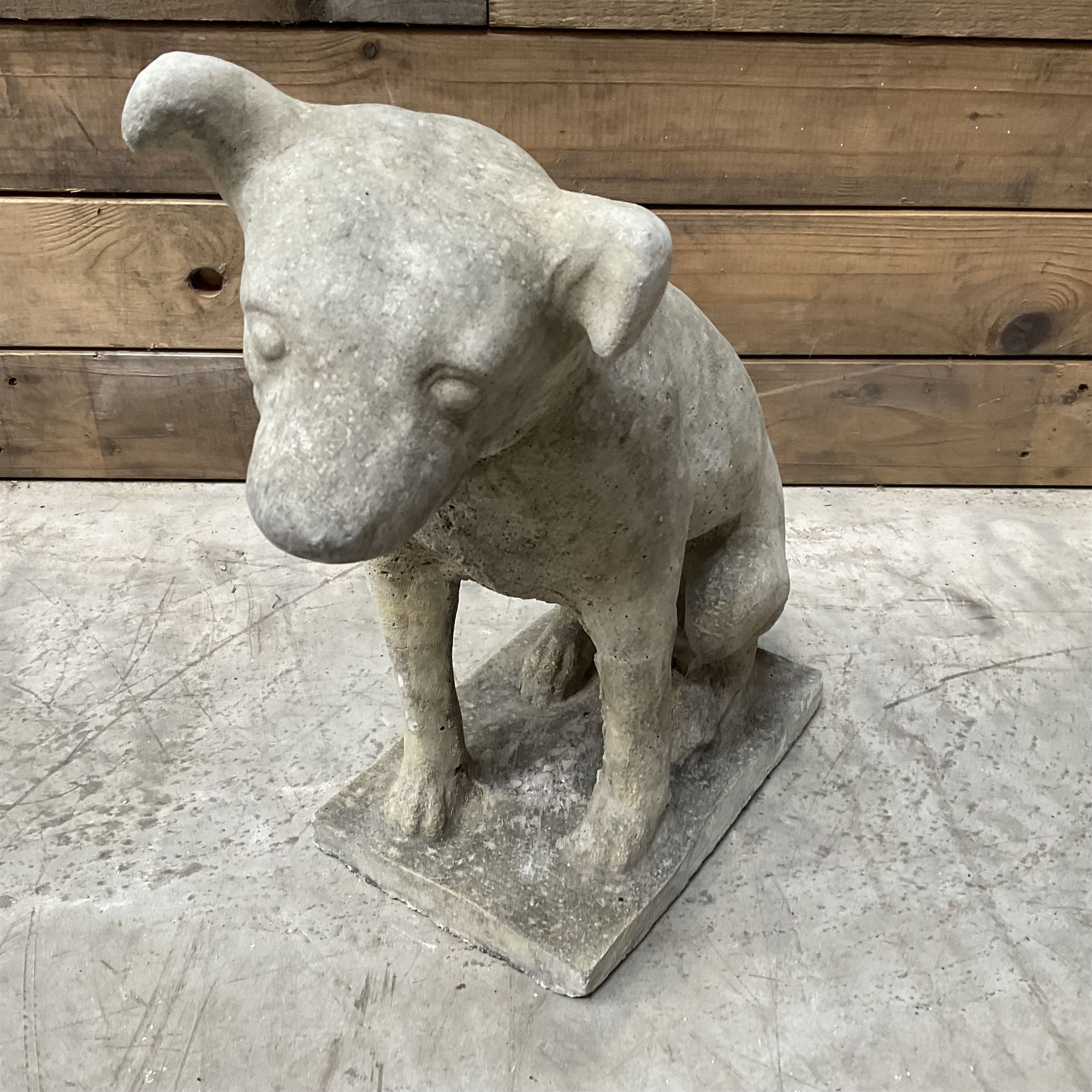 Cast stone garden figure of a Jack Russell terrier