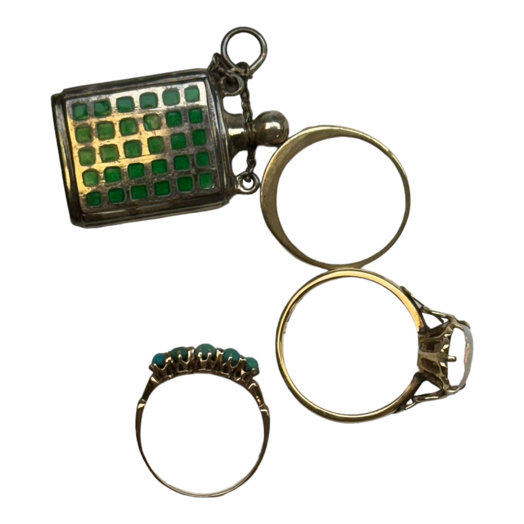 14ct gold single stone opal ring, two 9ct gold stone set rings including turquoise and amethyst and topaz and a silver enamel scent bottle pendant