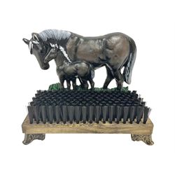 Cast iron horse and foal boot brush on wooden base, H25 cm