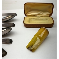 A set of six George III teaspoons, of Old English pattern with engraved initials to terminal, hallmarked Samuel Godbehere, Edward Wigan & James Boult, London 1807, together with a cased faux amber cheroot holder with unmarked gold mount. 
