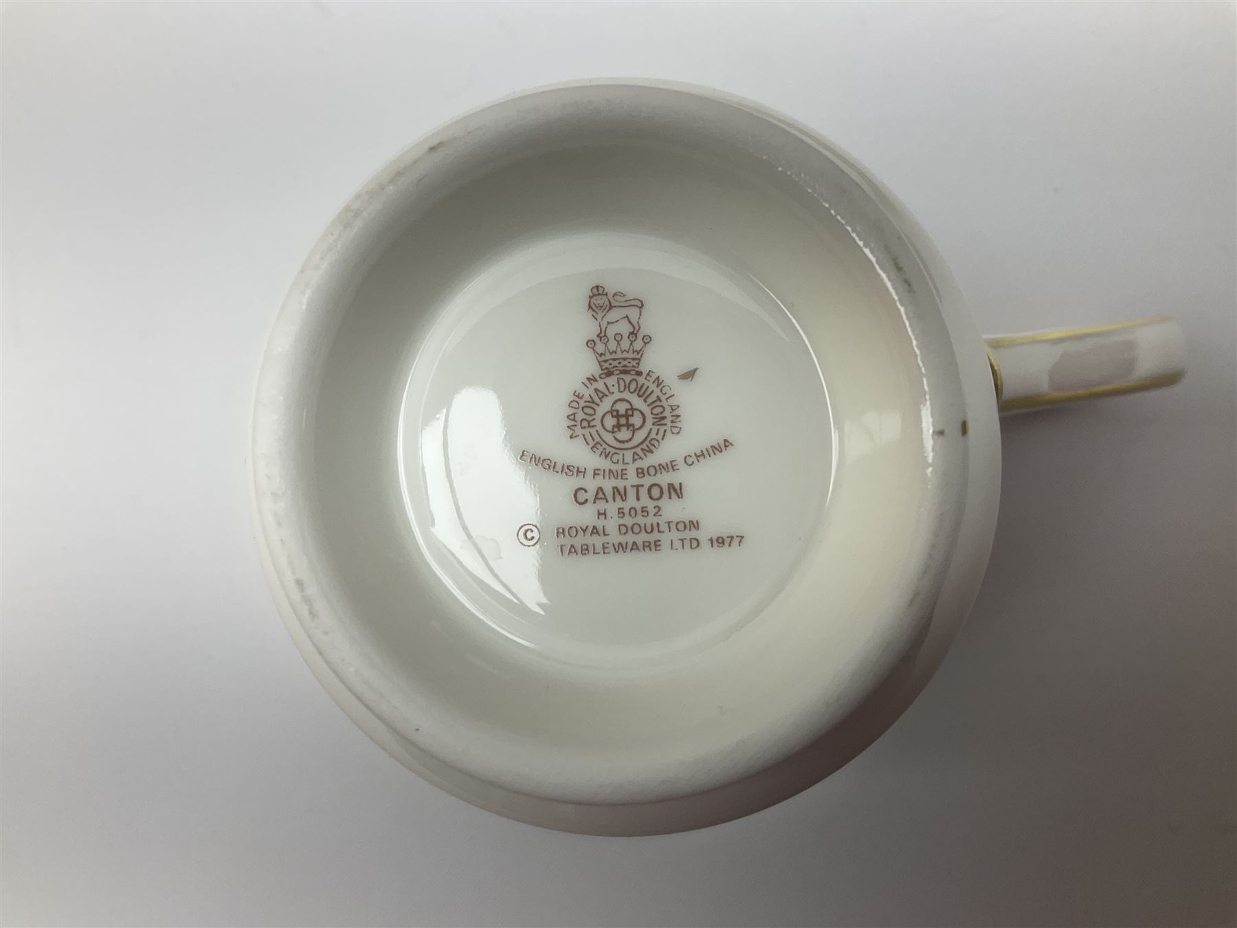 Wedgwood Queens Ware tea and dinner wares in Provence pattern, including ten cups and saucers, milk jug, butter dish with cover, ten dinner plates, ten bowls and ten side plates etc (71), together with Royal Doulton tea wares in Canton pattern, comprising six cups and saucers, milk jug, open sucrier and six dessert plates.    