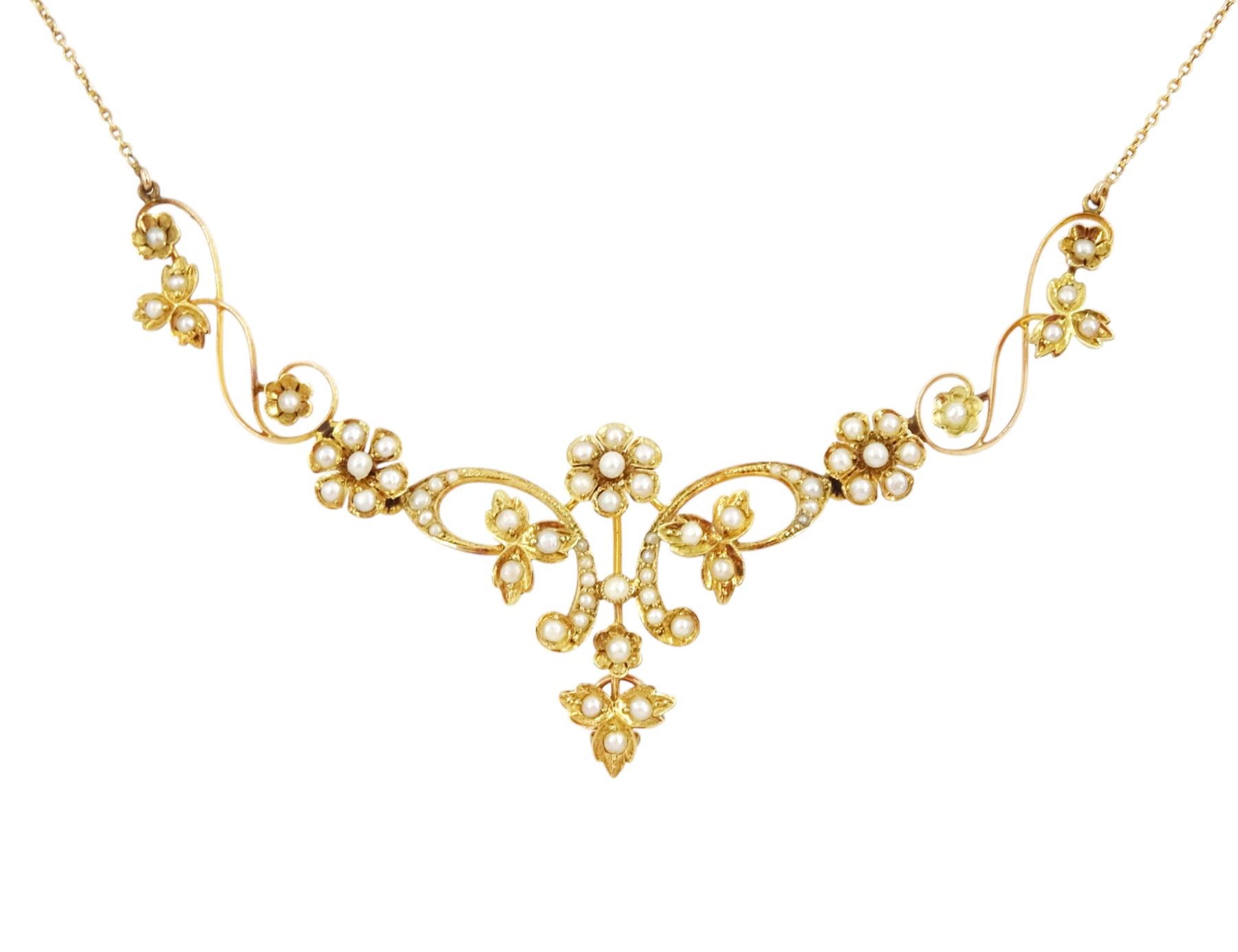Edwardian gold split pearl flower head and foliate necklace, stamped 15ct