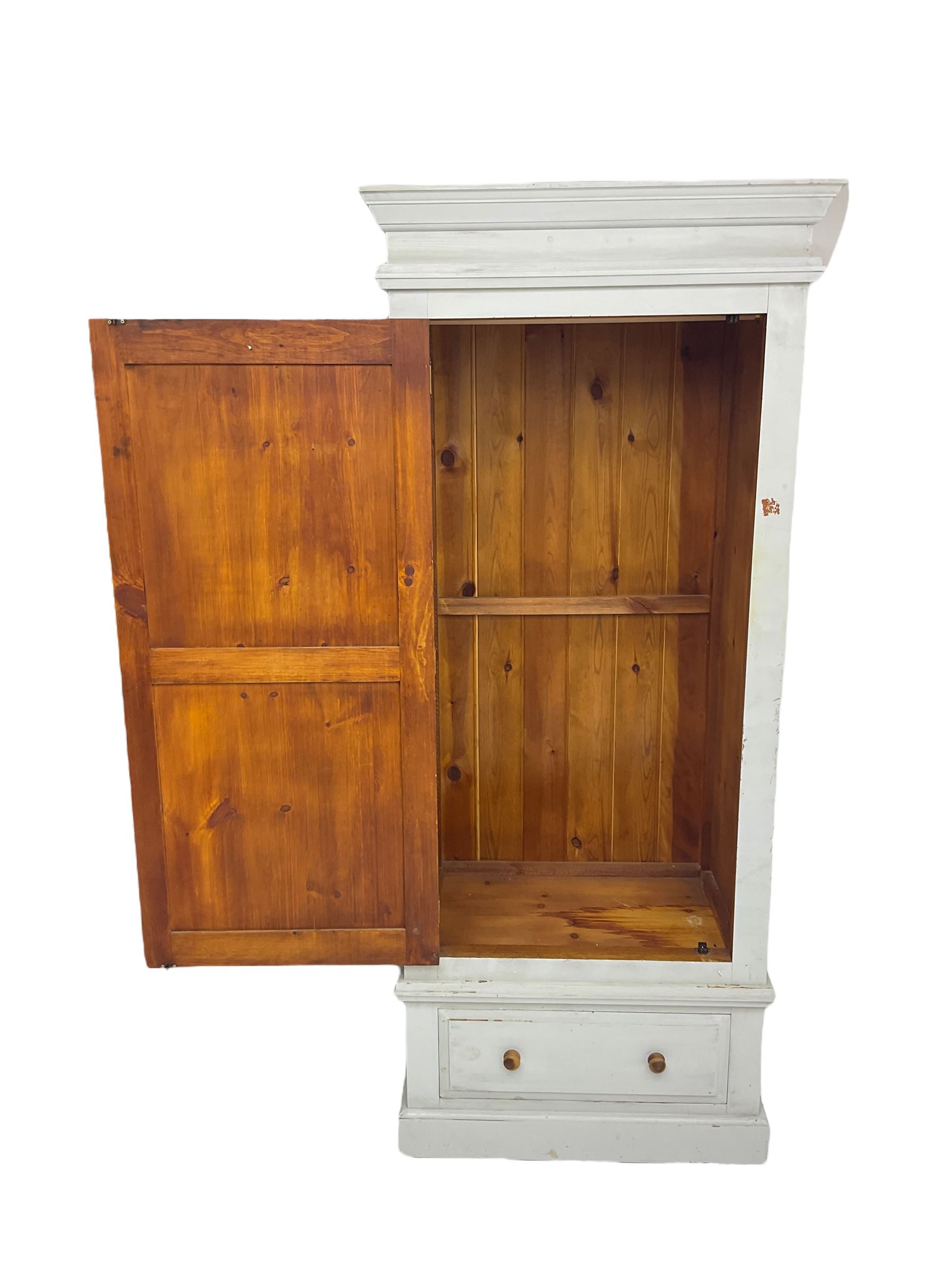 Painted pine single wardrobe, projecting cornice over panelled door, fitted with single drawer to base
