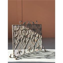 19th century wrought iron and mesh spark guard, decorated with conforming 'S' scrolls and standing on four out splayed supports (H53cm)  - COLLECTION BY APPOINTMENT FROM: The White House, Thirsk Road, Easingwold, York, YO61 3NF - CALL 01723 507111 TO ARRANGE