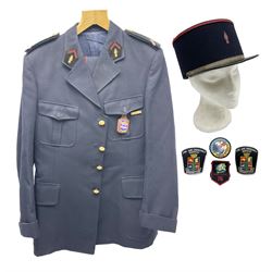 Mid 20th century French Ugeco Nantes first class dress navy blue uniform with ribbon bar with cap, and quantity of Sapeurs Pompiers patches, Sapeurs Pompiers de Caen belt buckle etc