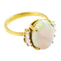 18ct gold single stone opal ring, with four round brilliant cut diamonds set either side, old opal ring, with four diamonds set either side