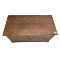 Hong Kong camphor wood chest, rectangular hinged top, carved all over with traditional scenes and dragon boats, on bun feet