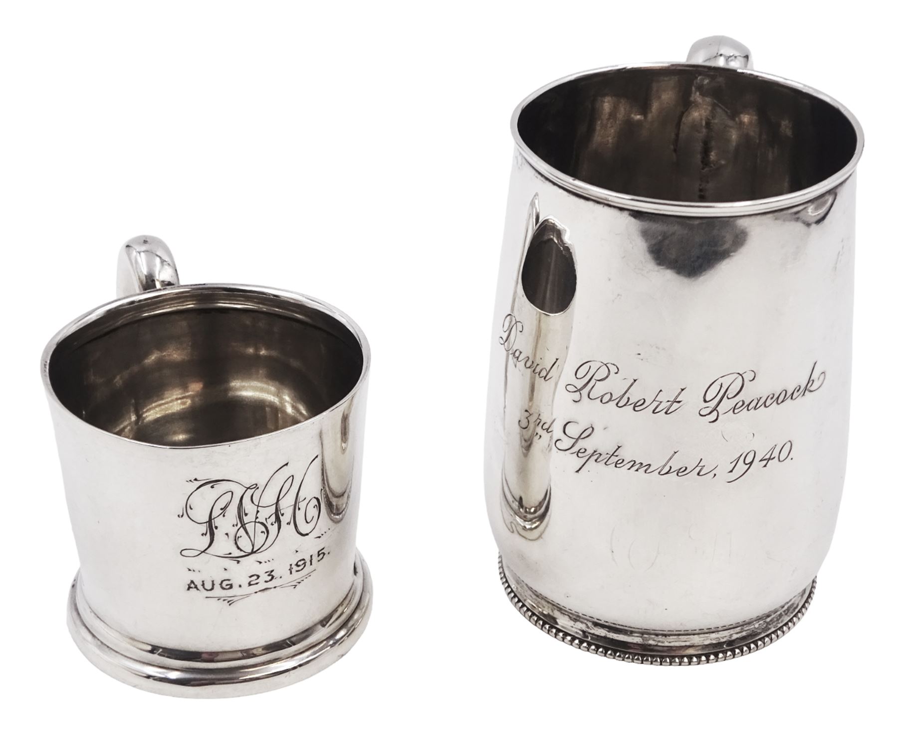 Early 20th century silver christening mug, of tapering cylindrical form, with C handle and personal engraving to centre, upon stepped base, hallmarked Chester 1913, maker's mark worn and indistinct, together with a Victorian silver christening mug, of slightly tapering form, with C handle, later personal engraving to centre and beaded rim to base, hallmarked James Dixon & Sons Ltd, Sheffield 1880, tallest H9cm