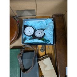 Three Rabone tape measures in leather cases, one with broad arrow, three map wheels, pair of Moore & Wright calipers, W Harling alidade in Whippy leather case with broad arrow and a collection of slide rules