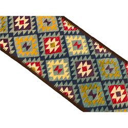 Chobi Kilim multi-colour runner rug, decorated with all-over geometric lozenges surrounded by a dark indigo border