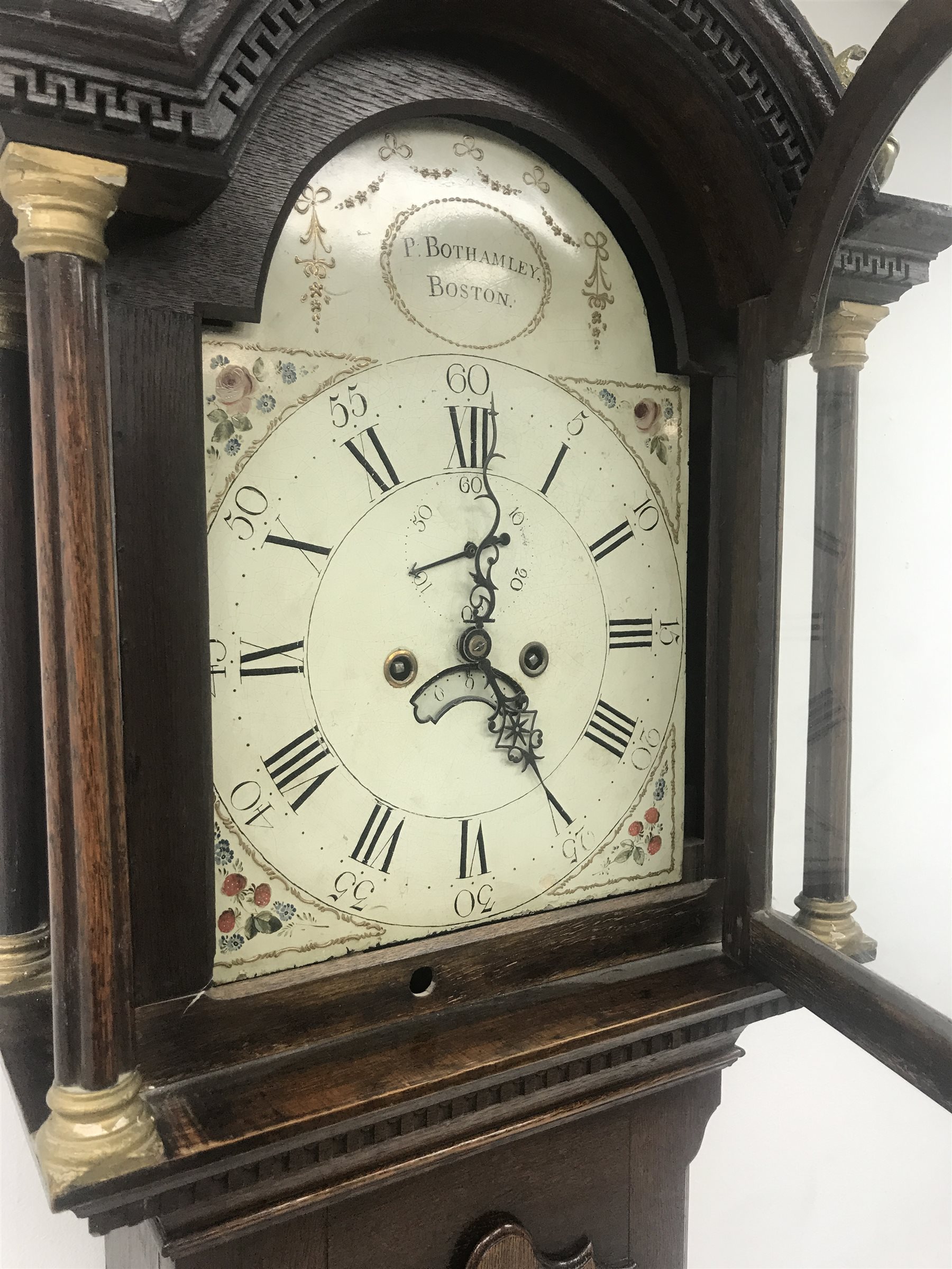 19th century oak longcase clock by Bothamley of Boston, arched top with key pattern cornice, painted dial with Arabic and Roman numerals, subsidiary seconds dial and calendar aperture, eight day movement striking on a bell, H197cm