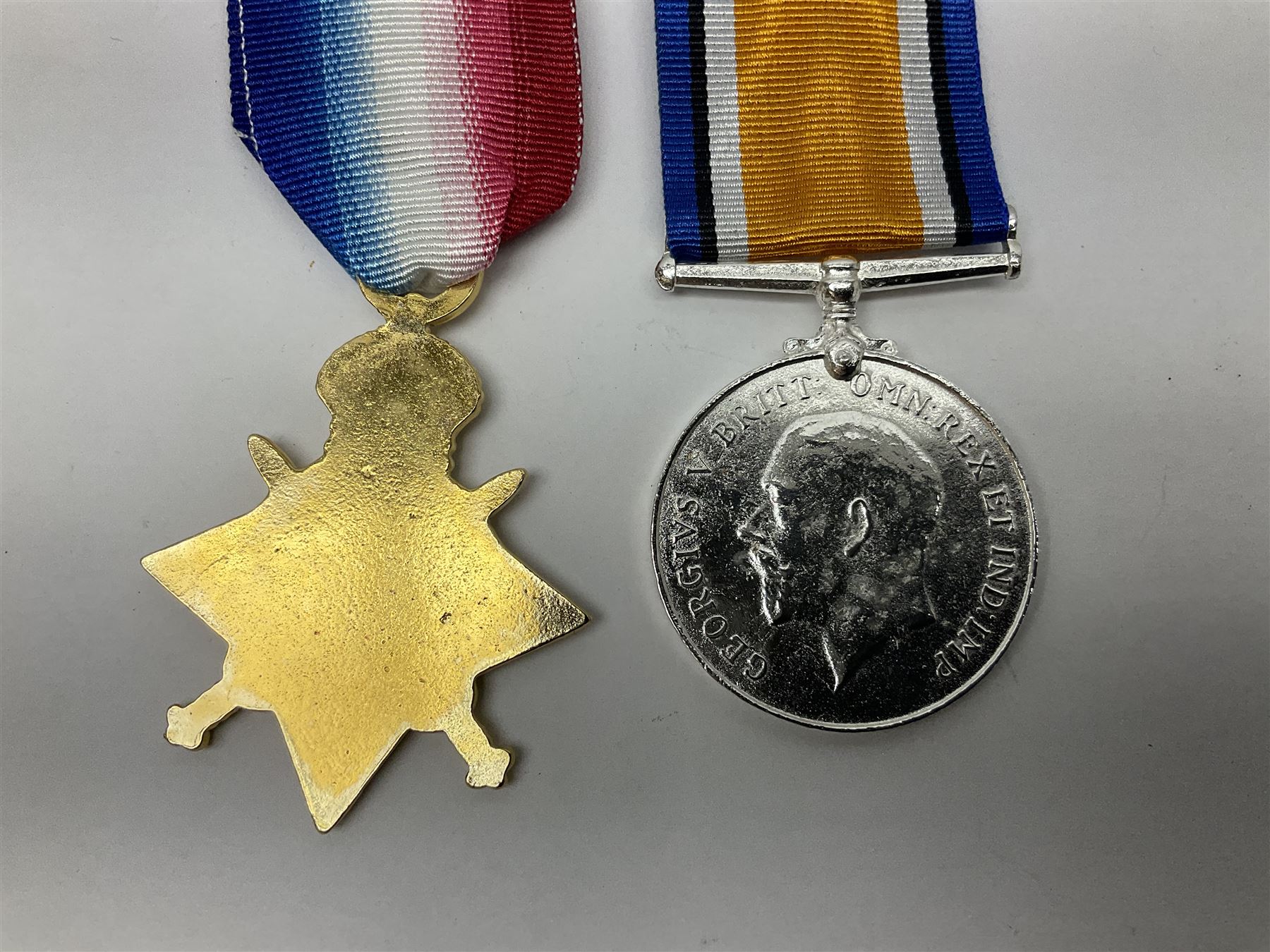 Gaunt & Son Territorial Force Nursing Service cape medal; cased; WW1 British War Medal and 1914-15 Star (names erased); two MID oak leaves; Polish and American medals; eight replica medals including VC, MM, Air Crew Europe Star etc and replica group of five WW2 miniatures etc