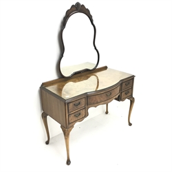 Queen Anne style walnut bedroom suite consisting of double arched top wardrobe, two doors, plinth base on shell carved cabriole feet (W123cm, H200cm, D55cm) a matching knee hole dressing table, raised mirror back, five drawers, shell carved cabriole legs (W114cm, H165cm, D60cm) a double 4'6